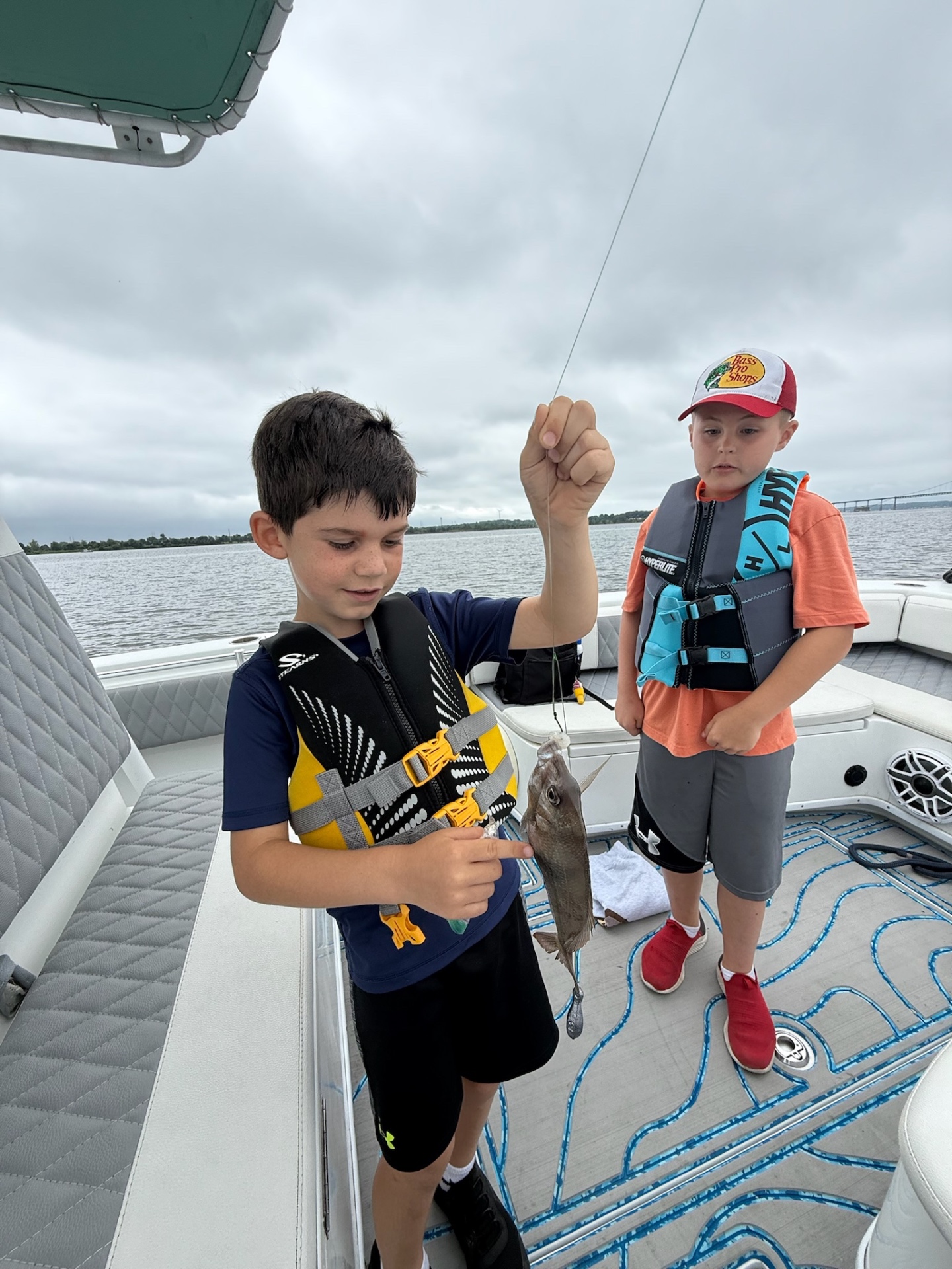 Academy campers with a scup