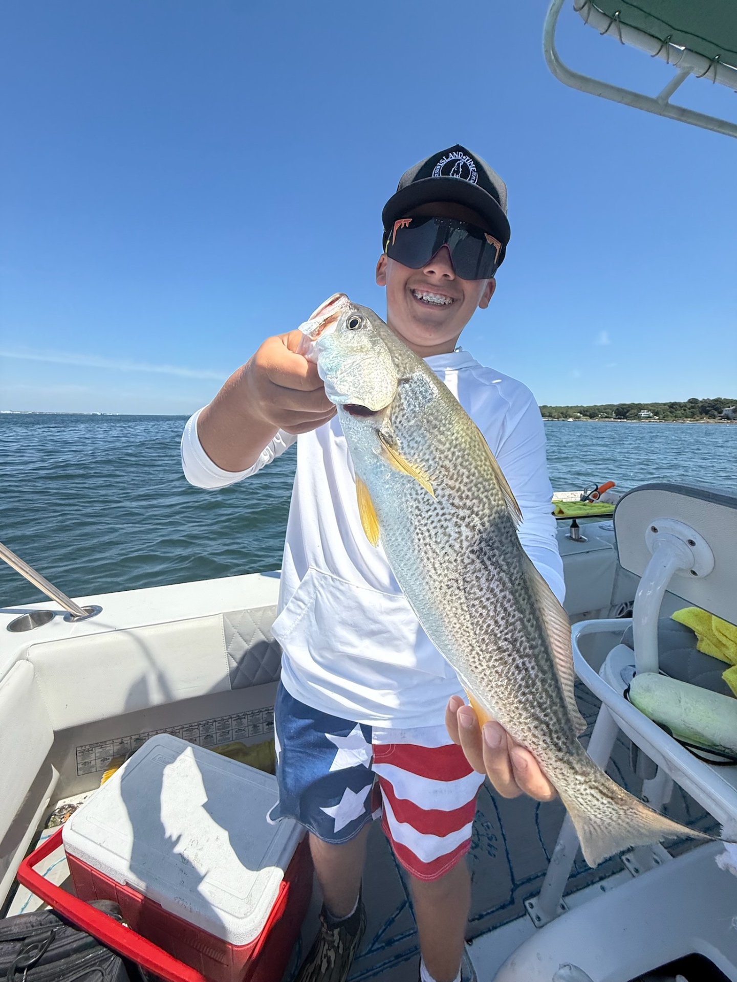 Academy camper with a weakfish