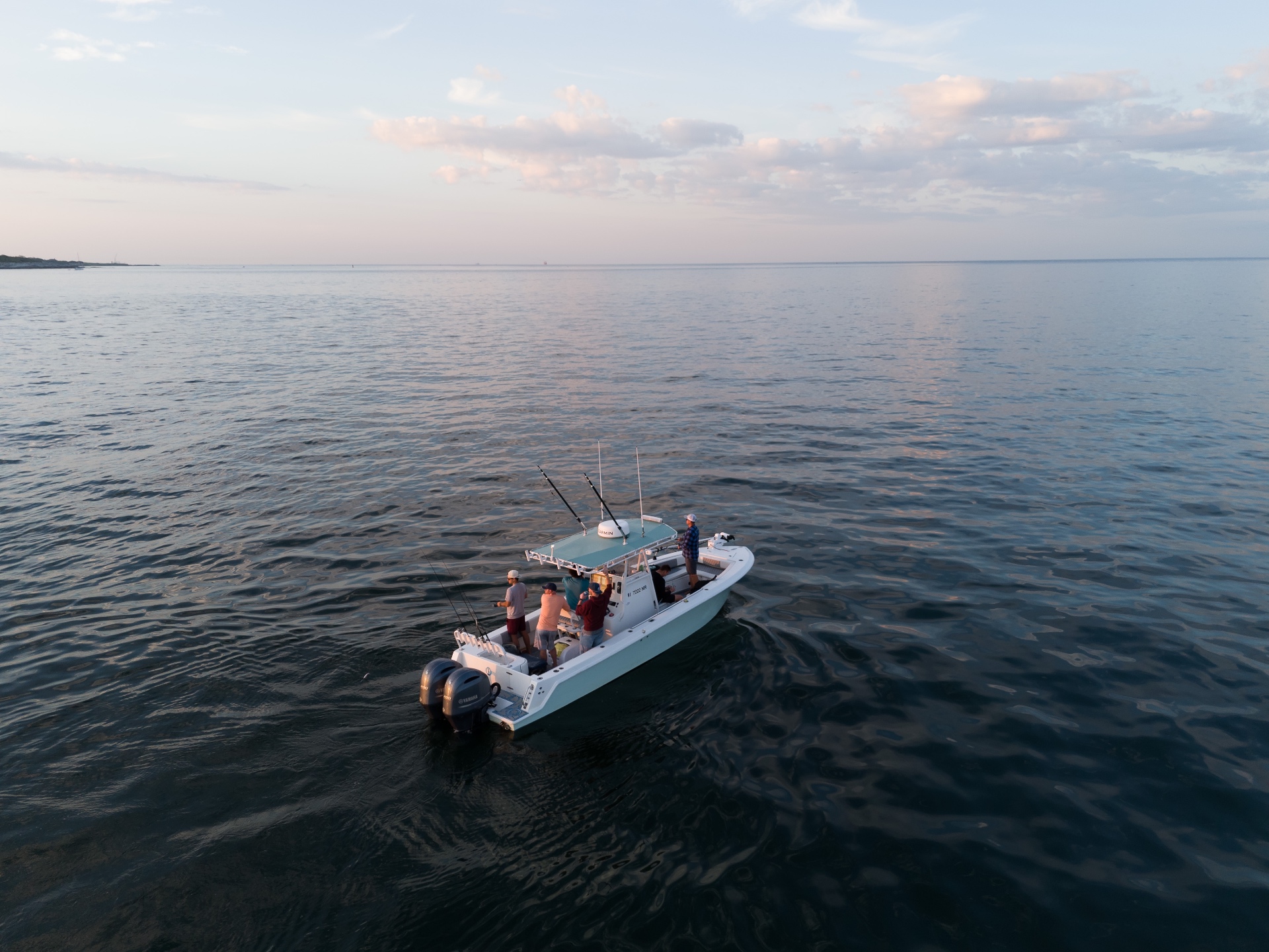 Island Time anchored on Narragansett Bay at dusk