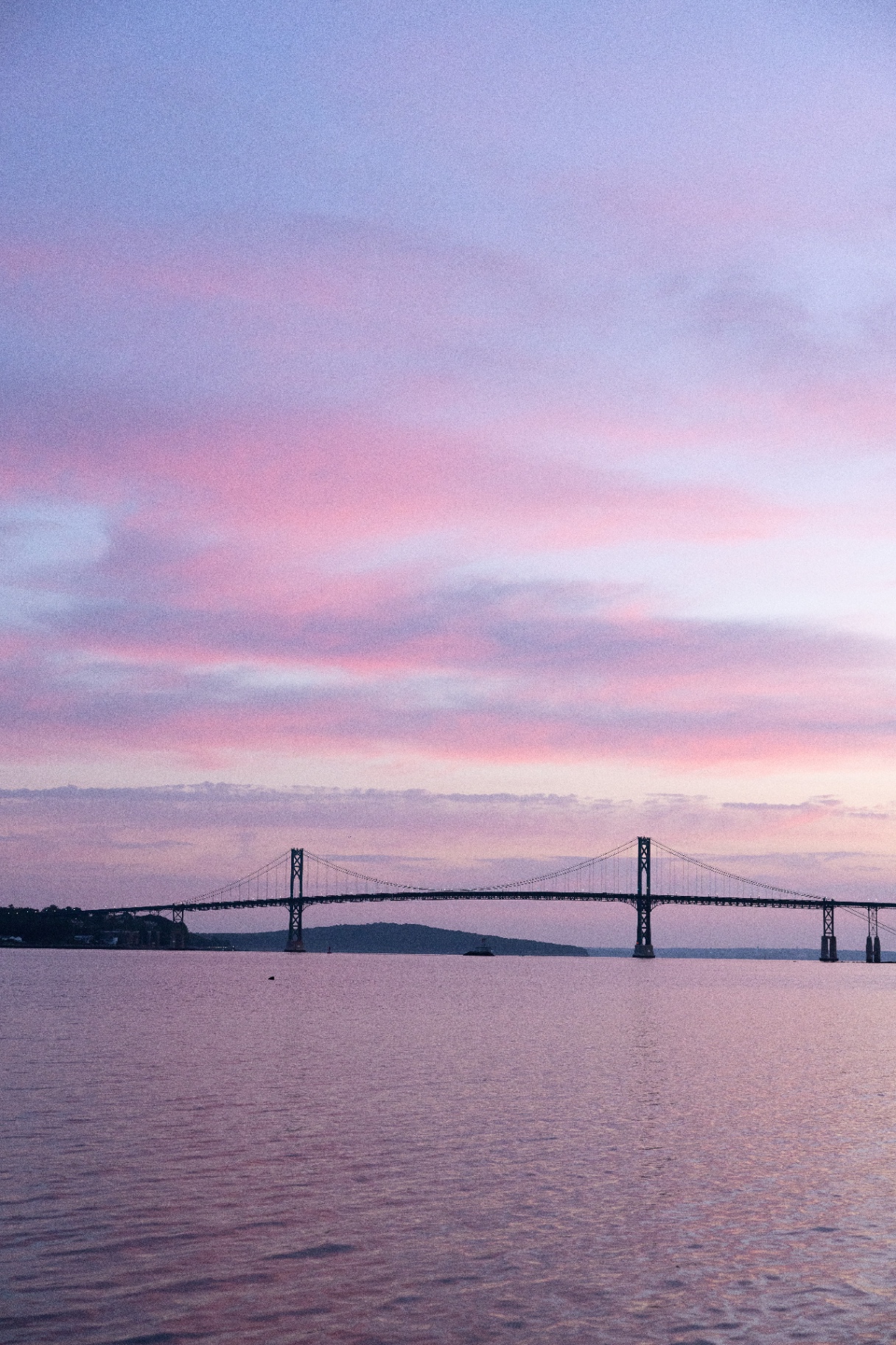 Mount Hope Bridge under a pastel sunset sky