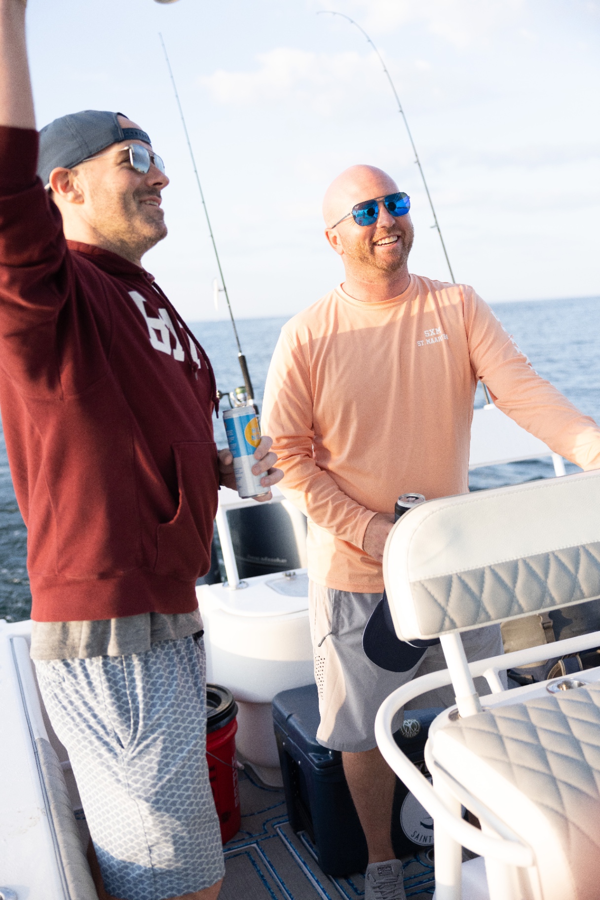Buddies laughing during a Narragansett Bay charter